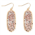 OVAL GLITTER FACETED DANGLE HOOK EARRINGS: GOLD PEACH
